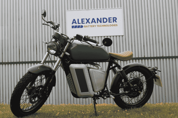 e-motorbike battery pack in front of sign